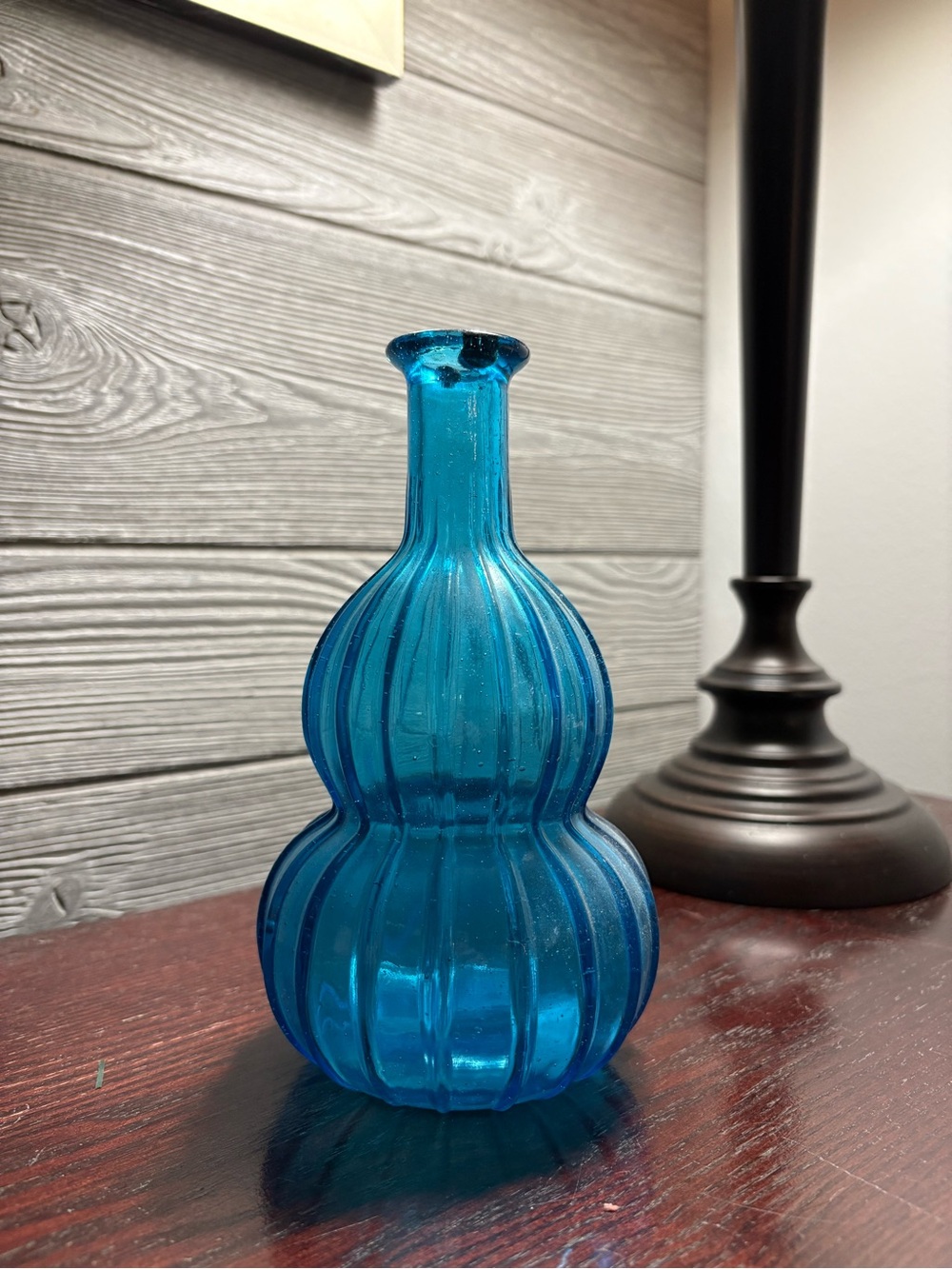 Vintage Blue Glass Decanter 100% recycled glass with a textured diamond pattern.